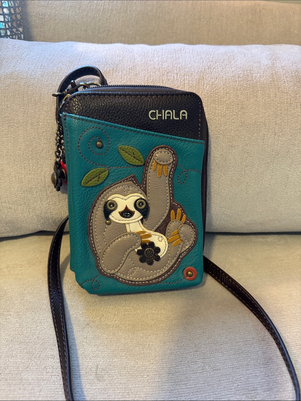 Chala Teal Sloth Crossbody Bag with Brown Trim